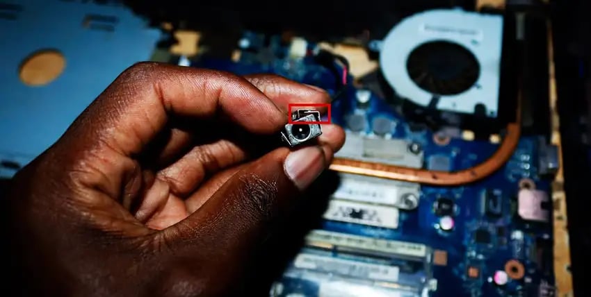 metal plates surrounding the charging port