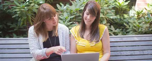 Kaspersky Lab women looking laptop