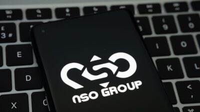 nso,group,logo,seen,on,the,smartphone,placed,on,laptop