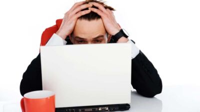 man holding his head